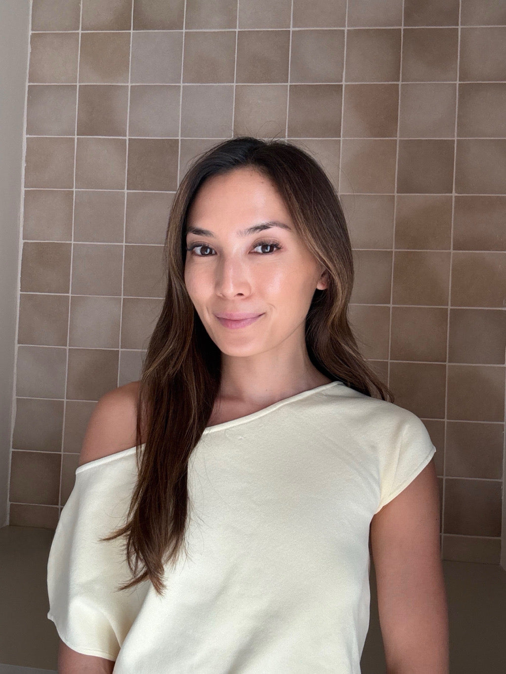 Lina, founder of Kind Chaos, at home
